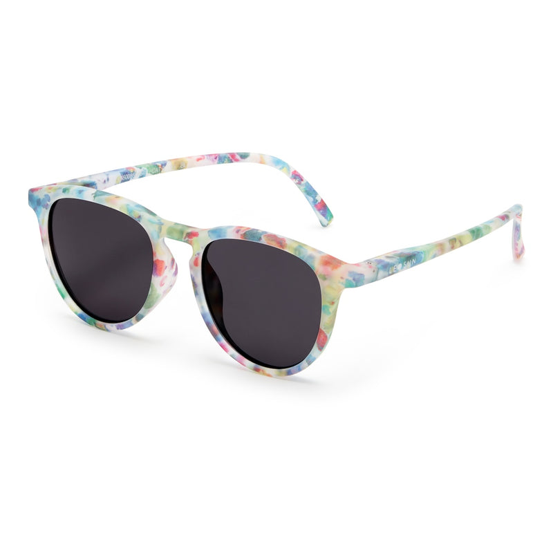 Sunglasses with colorful frame and dark lenses on a white background