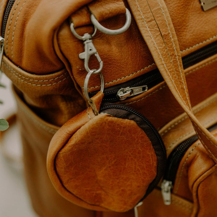 Brown leather backpack with dummy pouch